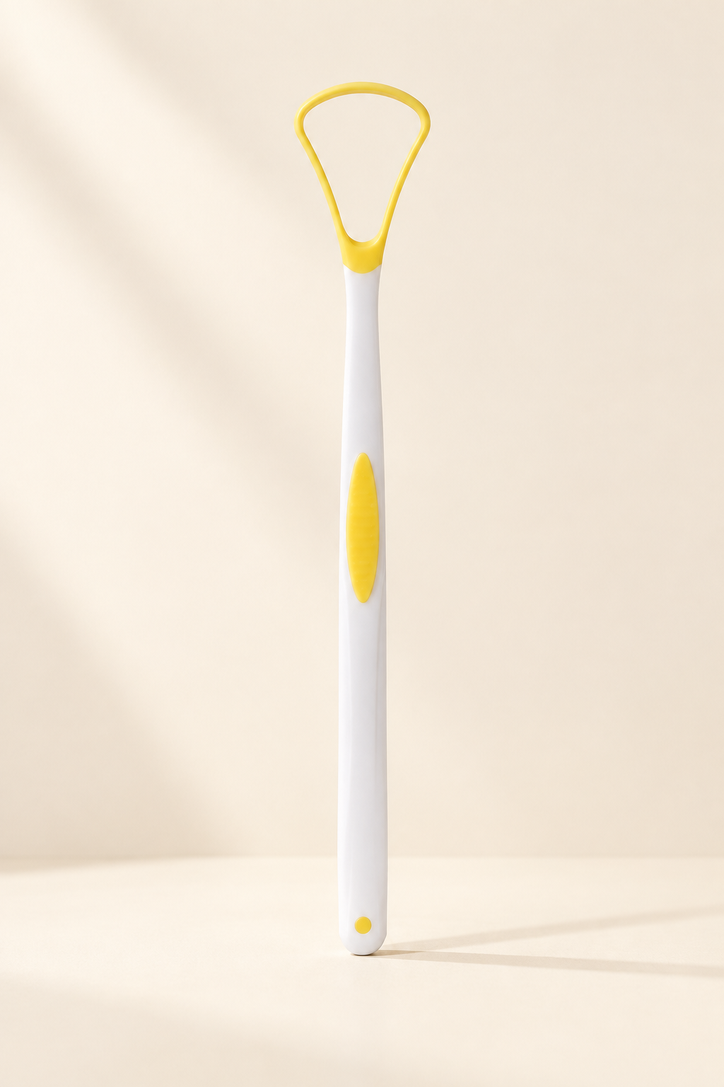 Gratte-langue jaune